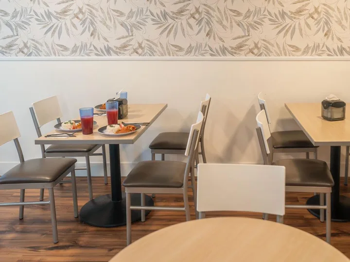 Dining room at Mind-U with a meal served